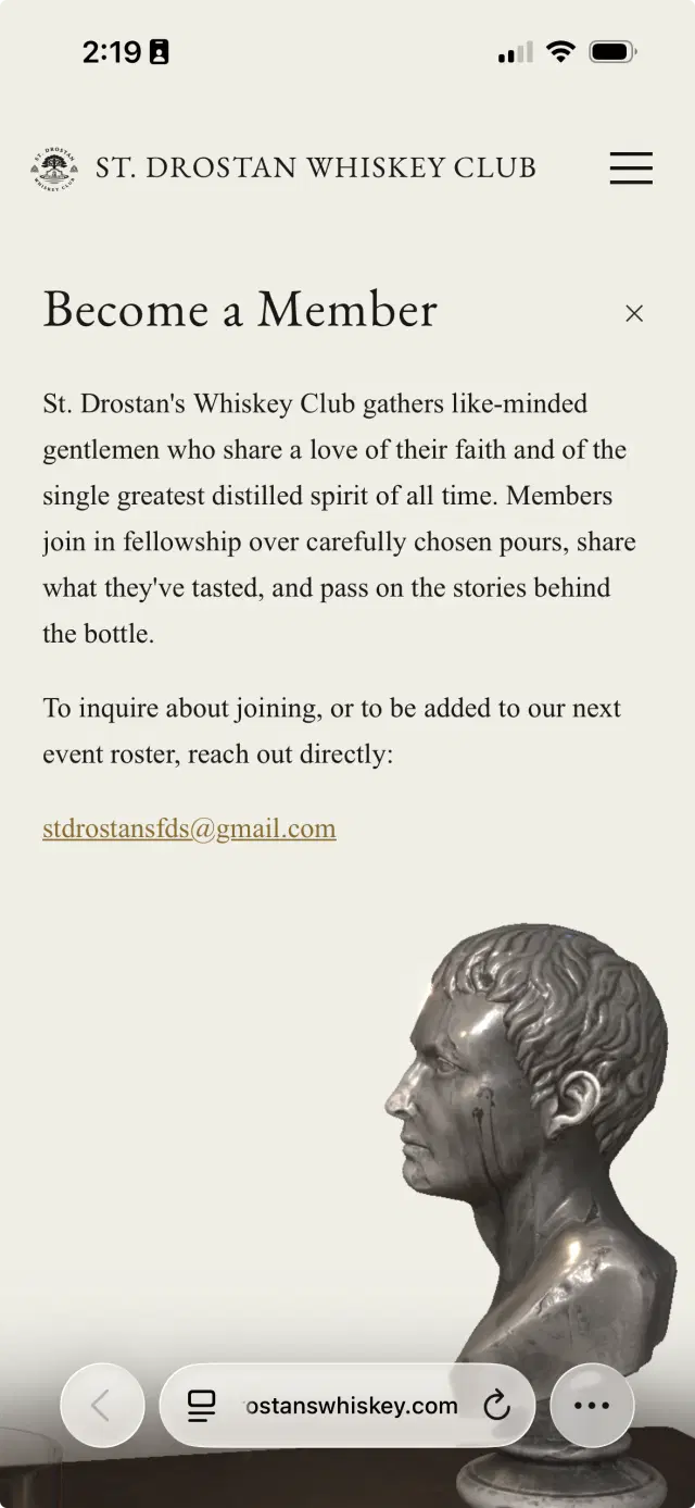 Saint Drostan Whiskey Club bust overlay on mobile